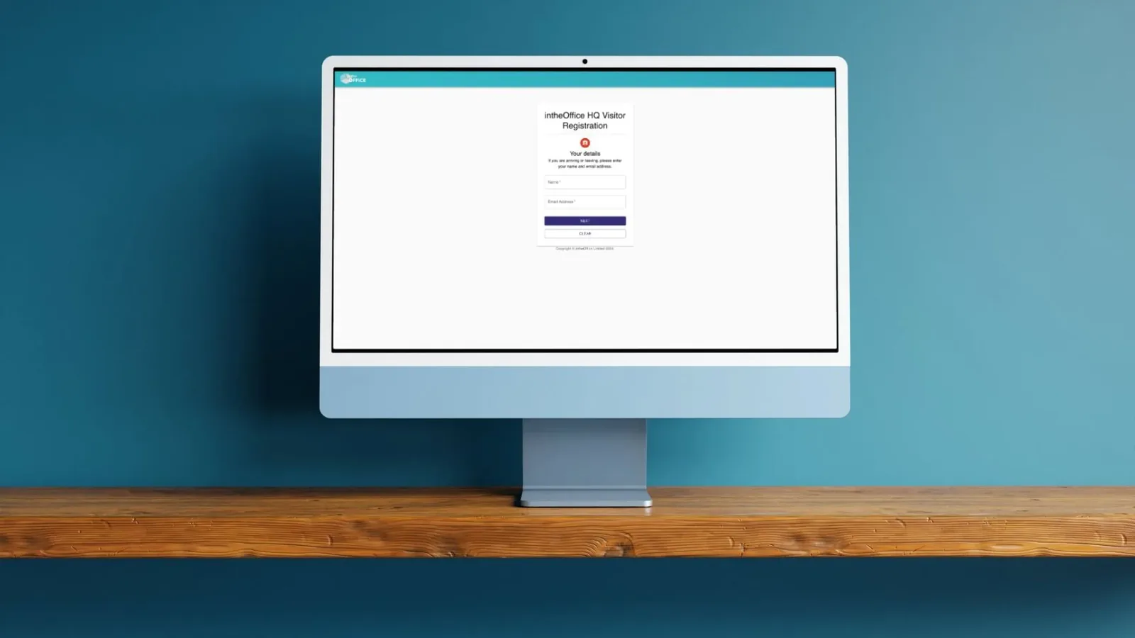 A branded intheOffice check-in screen on a reception monitor, headed intheOffice HQ Visitor Registration and asking for a name and email address.